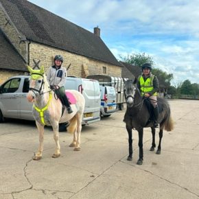 SILVIA THOMPSON buddy taking a green horse on a hack with him )